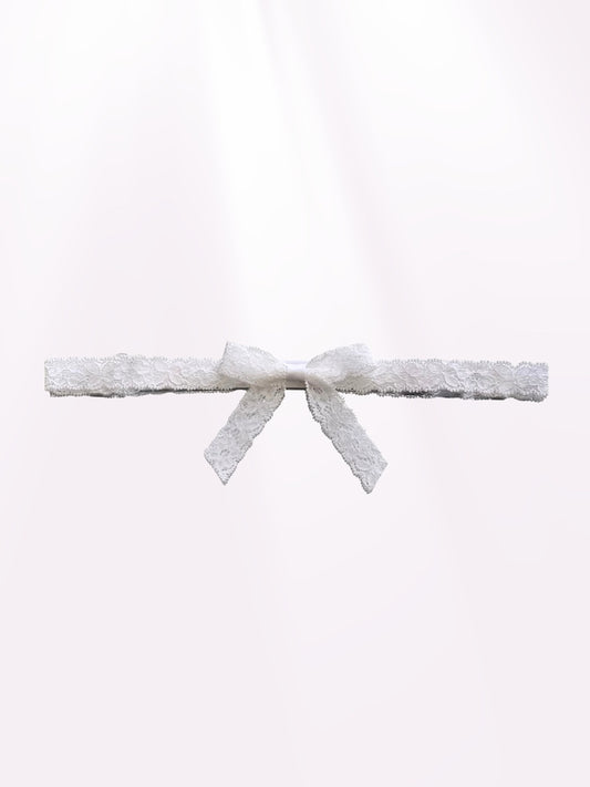 Bougee White Lace Bow Belt on Light Pink Background