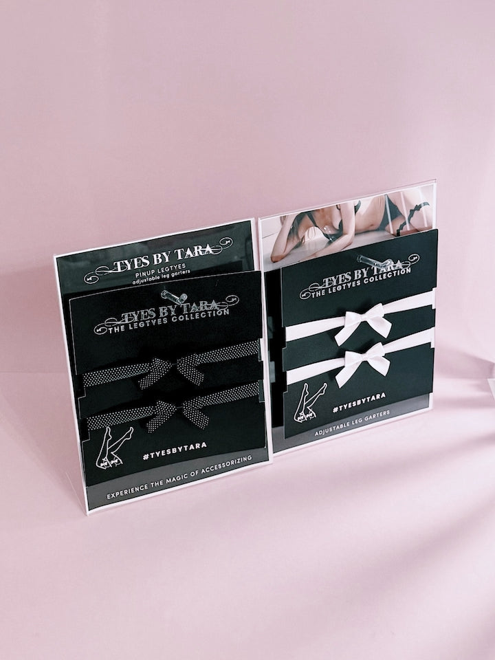 Pinup Legtyes Display Pack on Pink Background