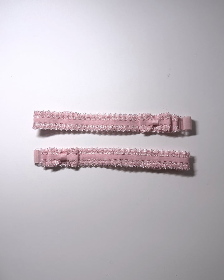 Lady Pink Elastic Leg Garters with soft adjustable straps on gray background flatlay