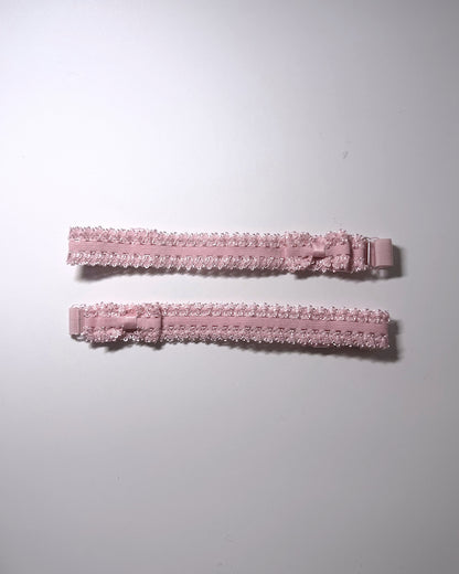 Lady Pink Elastic Leg Garters with soft adjustable straps on gray background flatlay