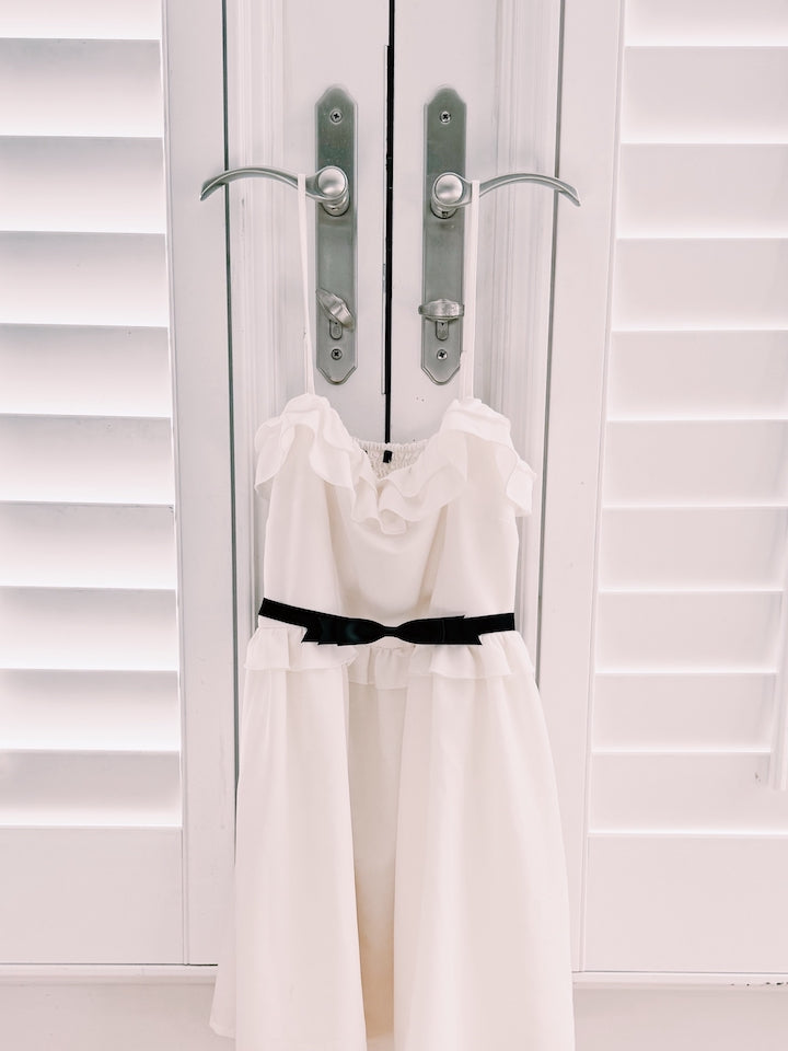 Enchantress Black Bow Adjustable Belt on White Dress