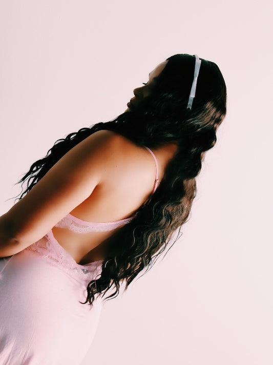 enchantress white hair bow band on model with long brunette hair