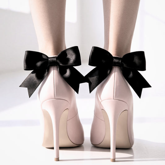 Bombshell Black Bow Heel Straps on pink blush heels