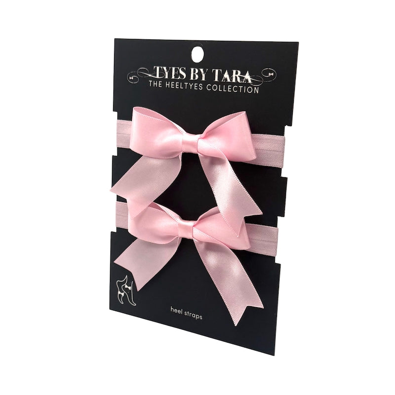 Bombshell Pink Bow Heel Straps on Black Card
