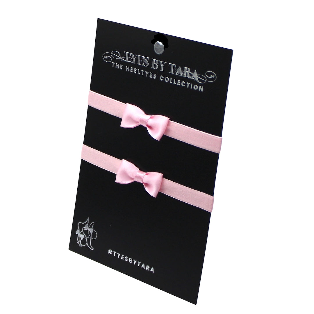 Pink Hickey Heel Straps on Black Card
