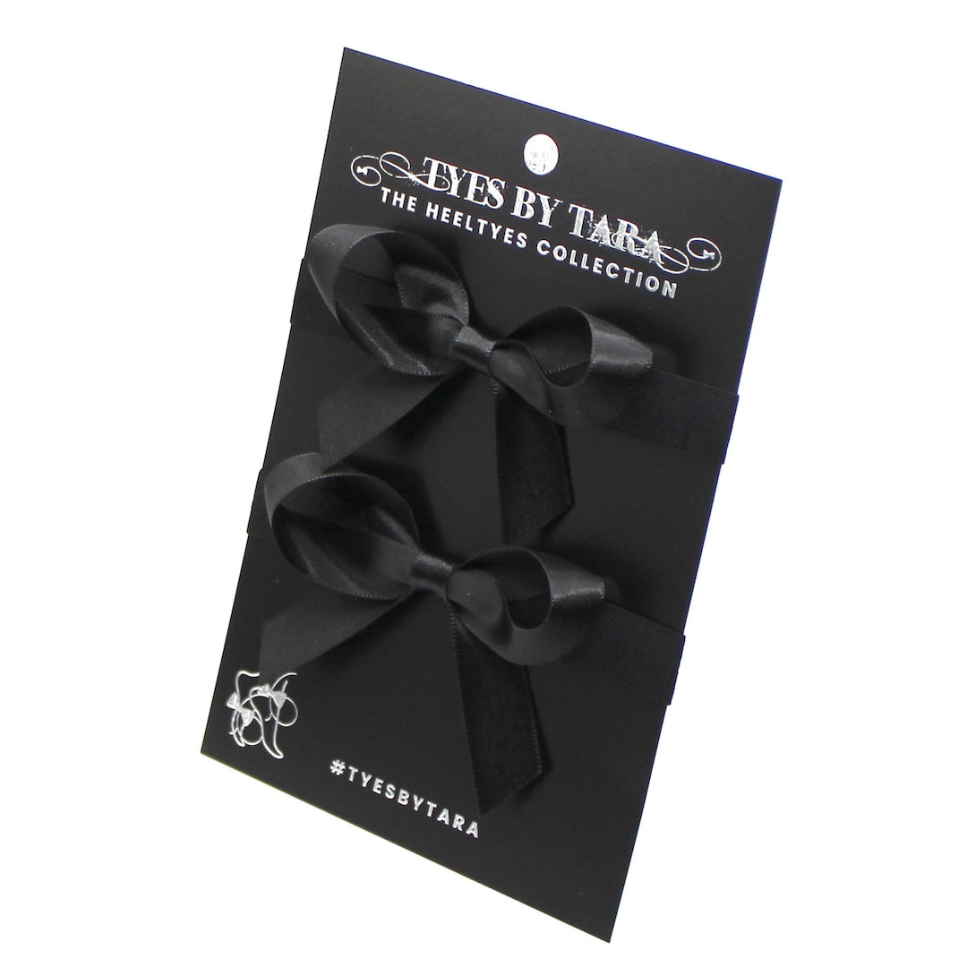 Black XO Heel Straps on Black Card