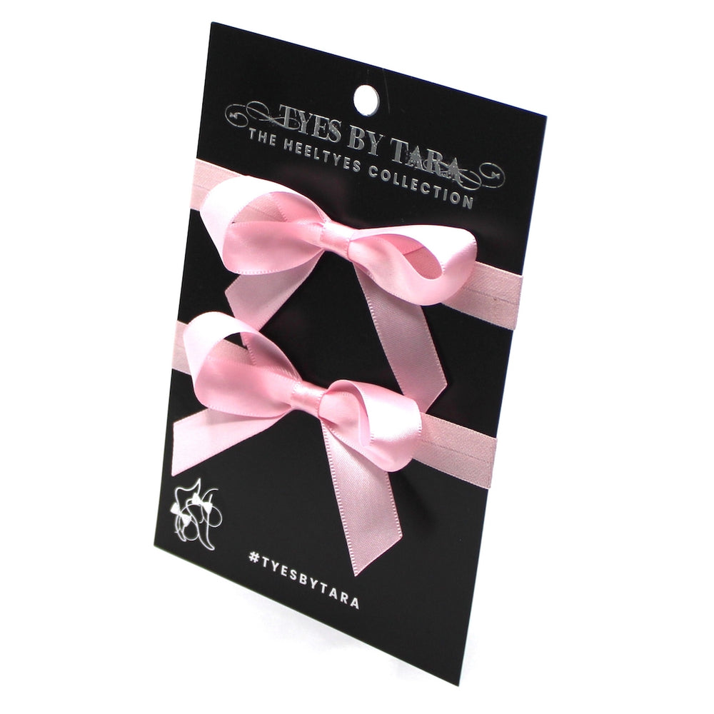 Pink XO Heel Straps on Black Card