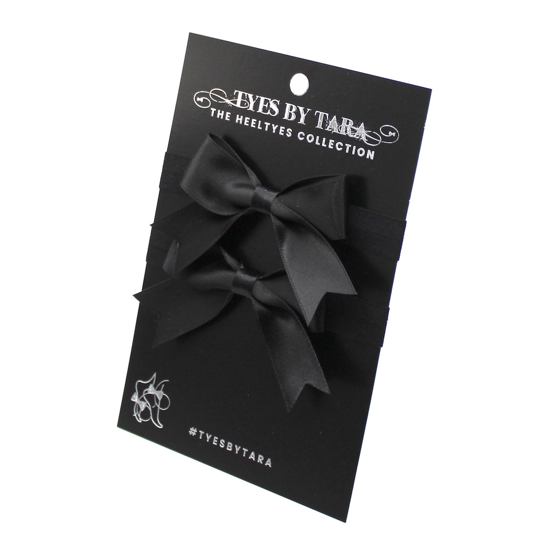 Black Bow Heel Straps on Black Card