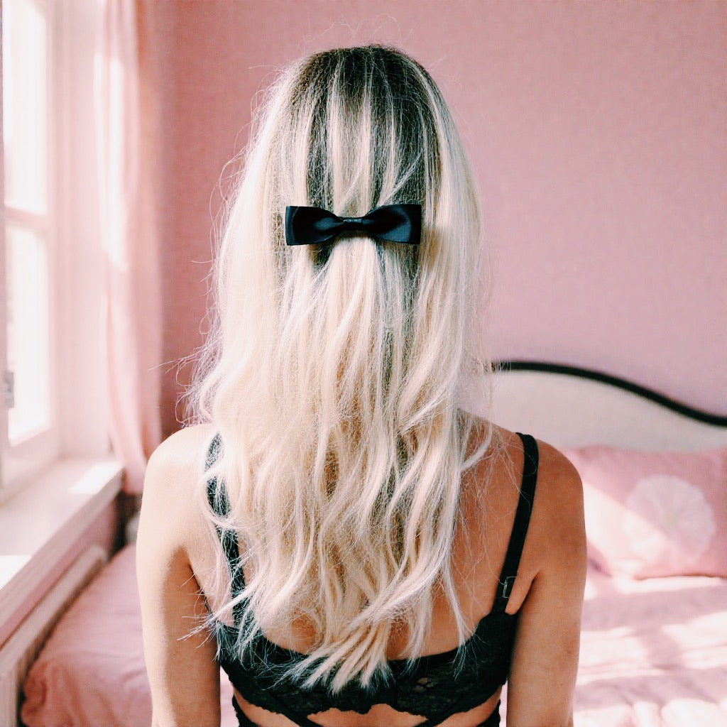 Blonde Wearing Black Femme Fatale Hair Bow