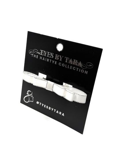 Queen White Silver Trimmed Hair Bow on Black Card