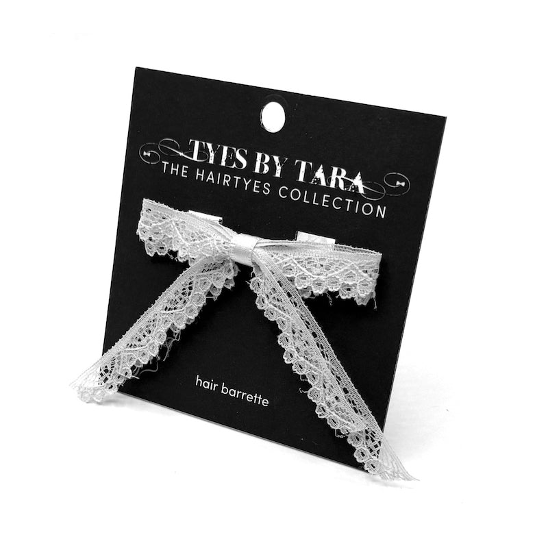 packaging view of white lace hair bow barrette
