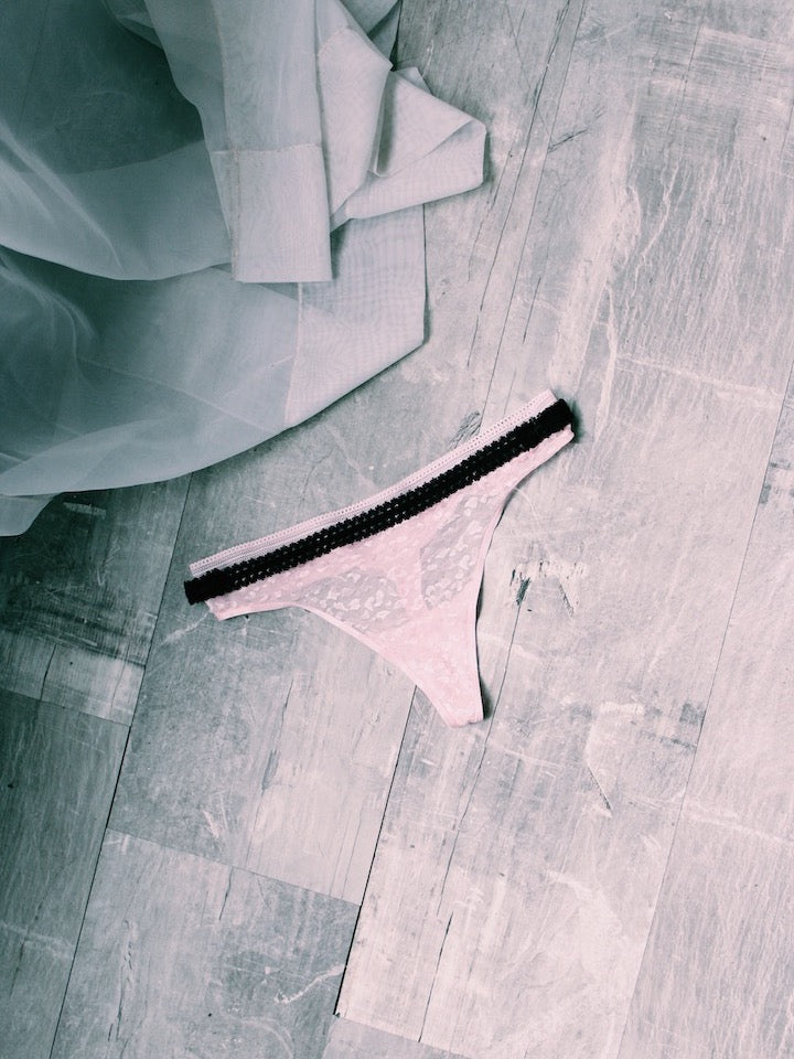 Lady Black Lingerie Belt on Pink Lingerie 