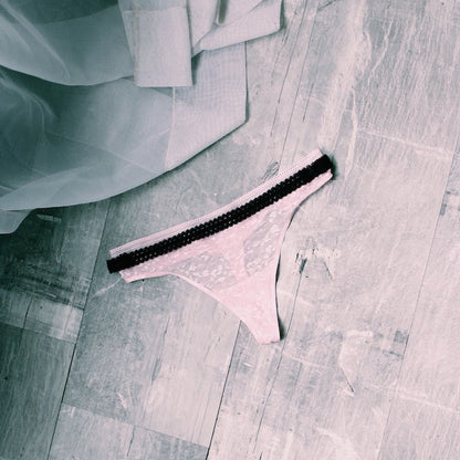 Lady Black Lingerie Belt on Pink Lingerie 