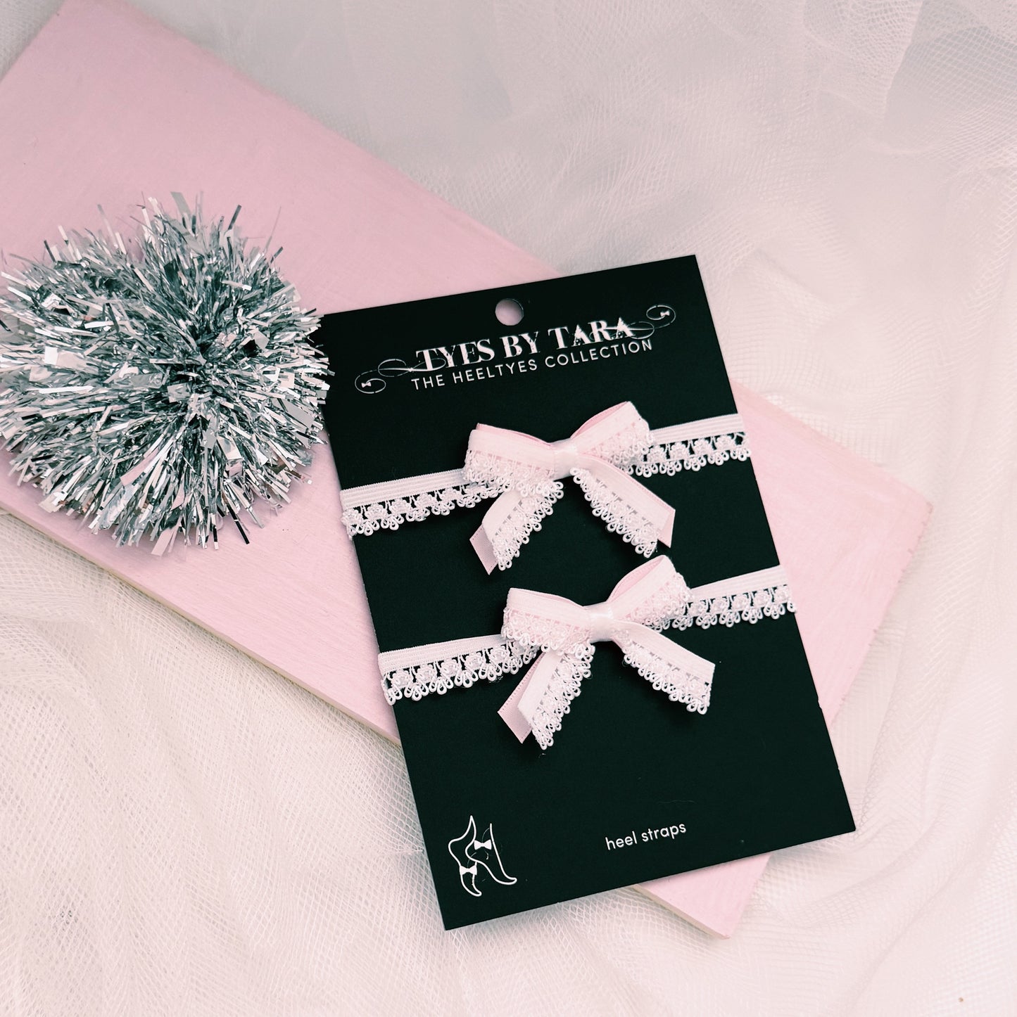 Belle White Heel Straps on Black Card