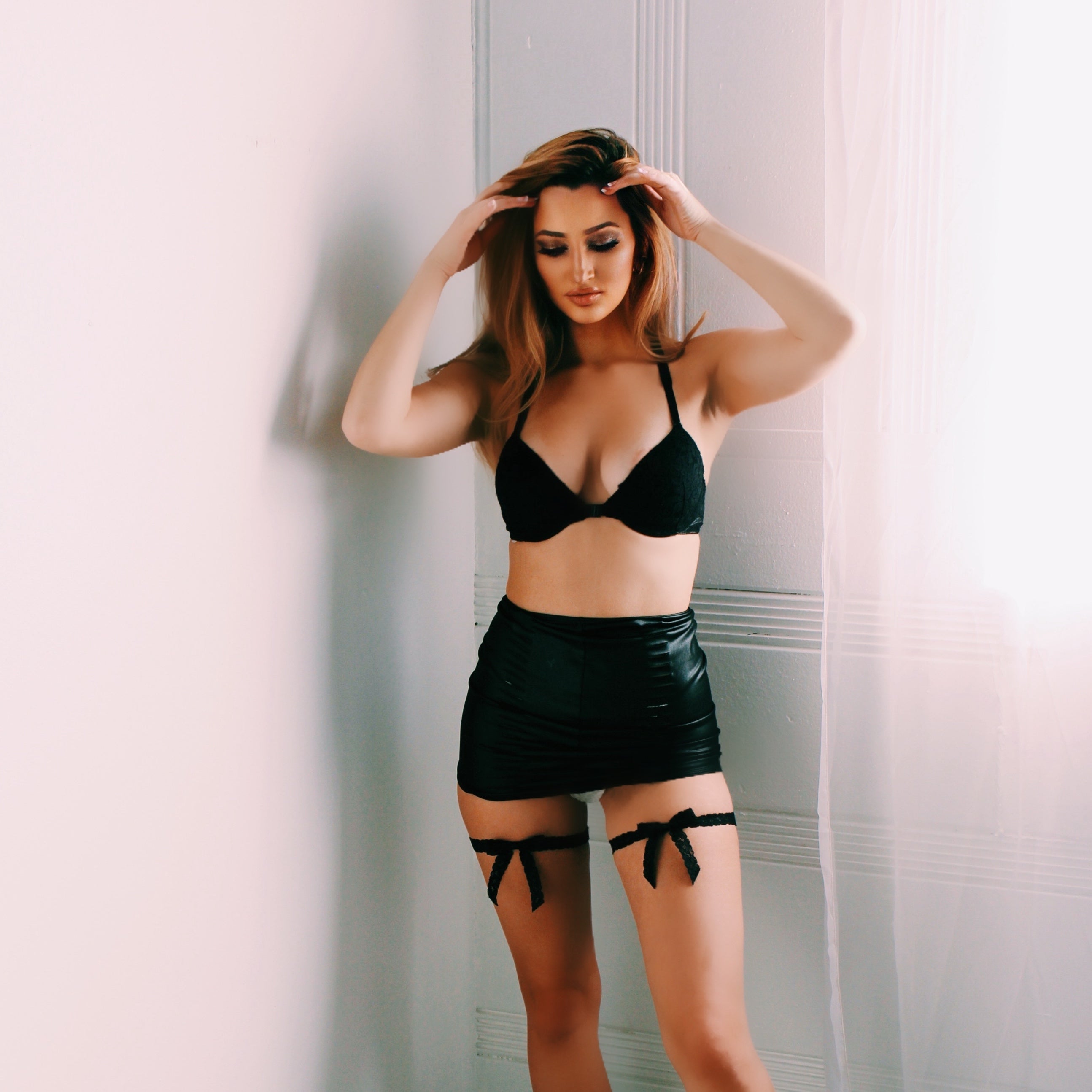 Model in Black Lace Leg Garters and Black Skirt