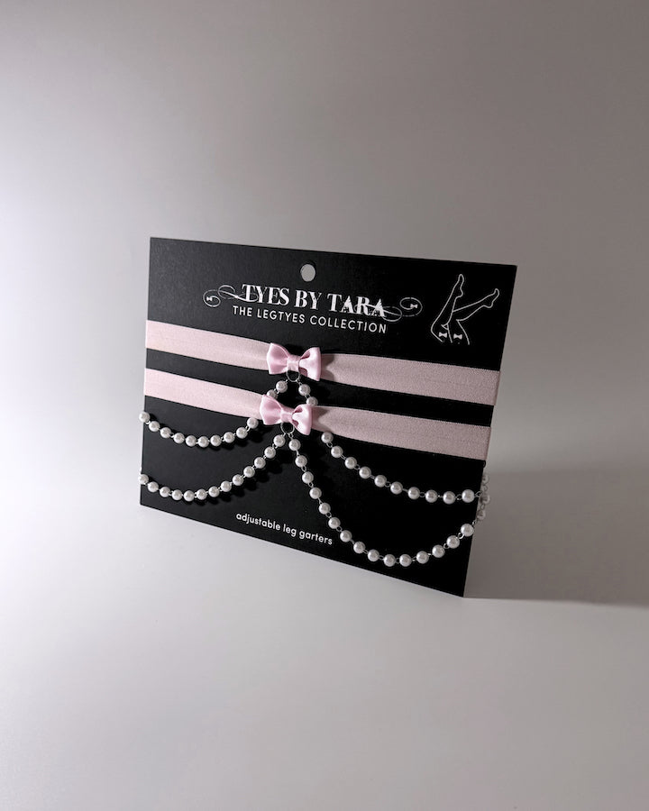 Packaging View of Centerfold Pink Pearl Leg Garters