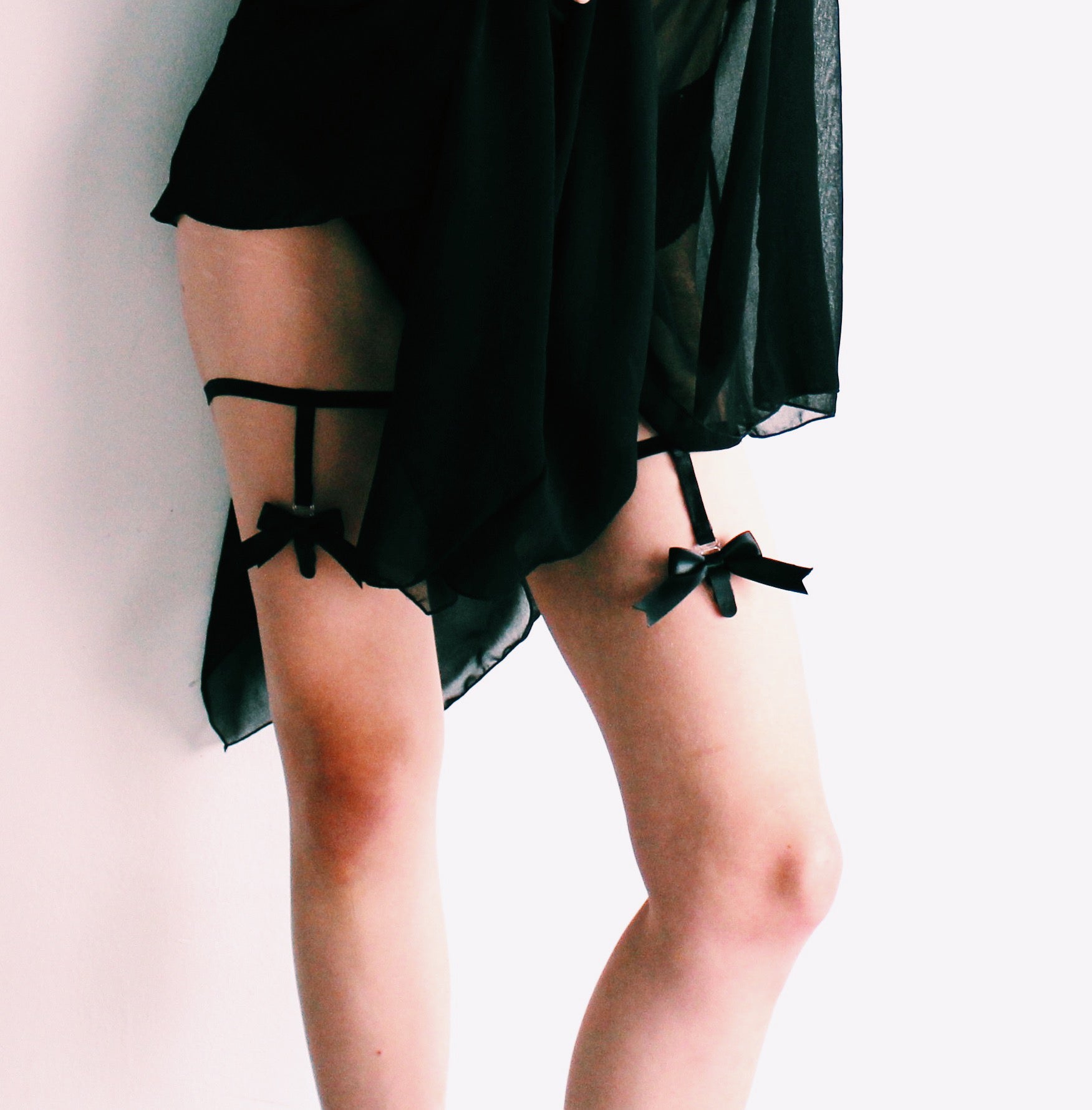 Model Wearing Empress Black Bow Leg Garters with Garter Clips