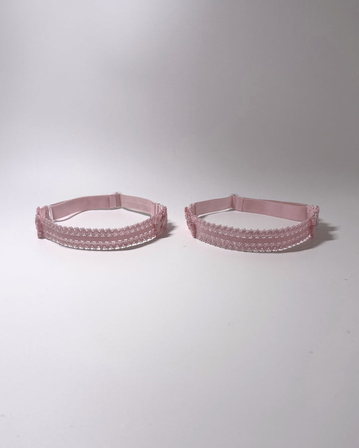Lady Pink Elastic Leg Garters with soft adjustable straps on gray background