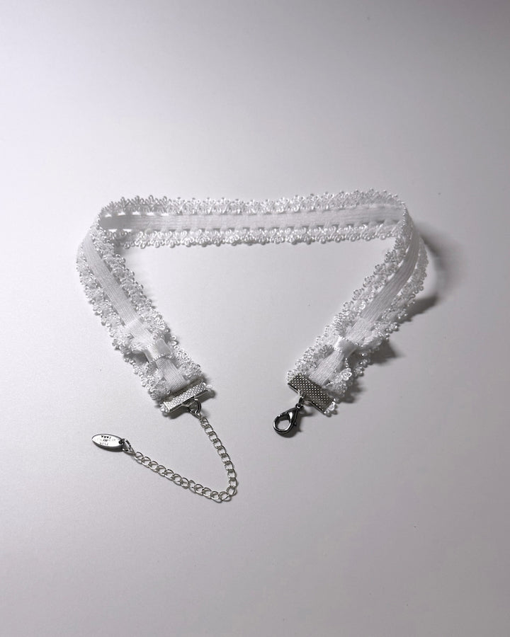 Lady White Elastic Bow Choker showing bows 