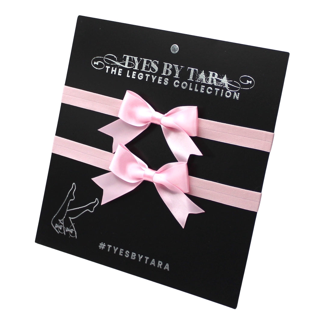 Pink Bow Leg Garters on Black Card