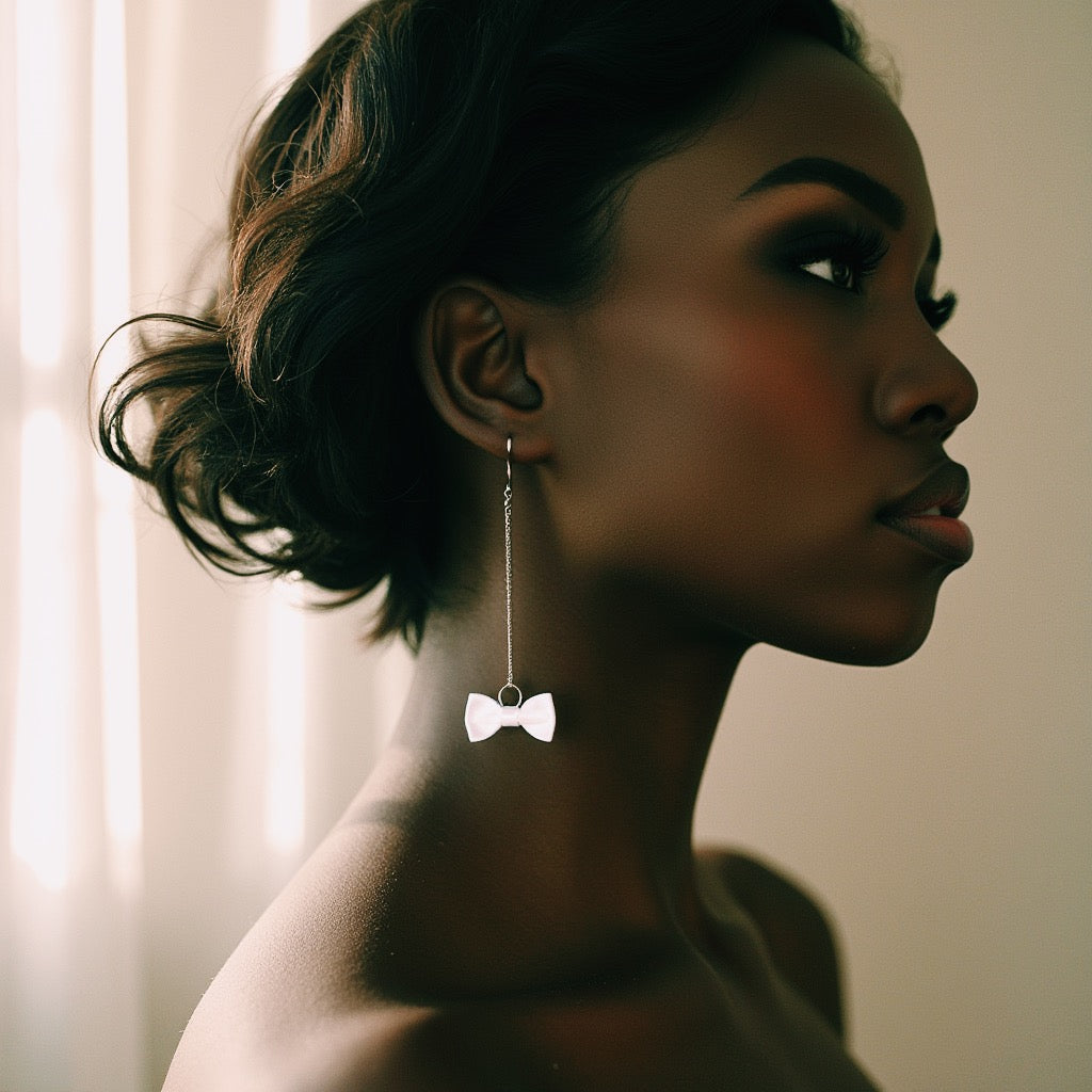 White Bow Earrings on Model with Short Hair