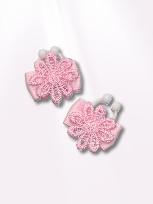 Pink Flower Bow Nipple Clamps on Pink Background
