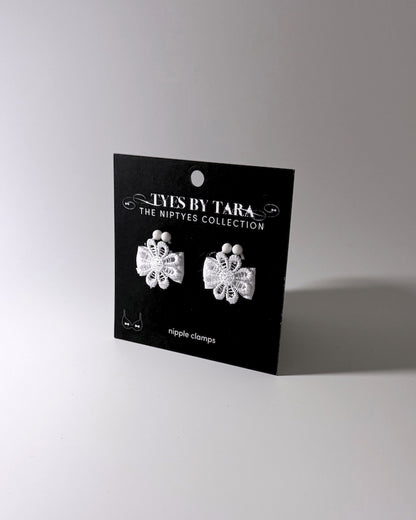 Packaging View White Flower Nipple Clamps