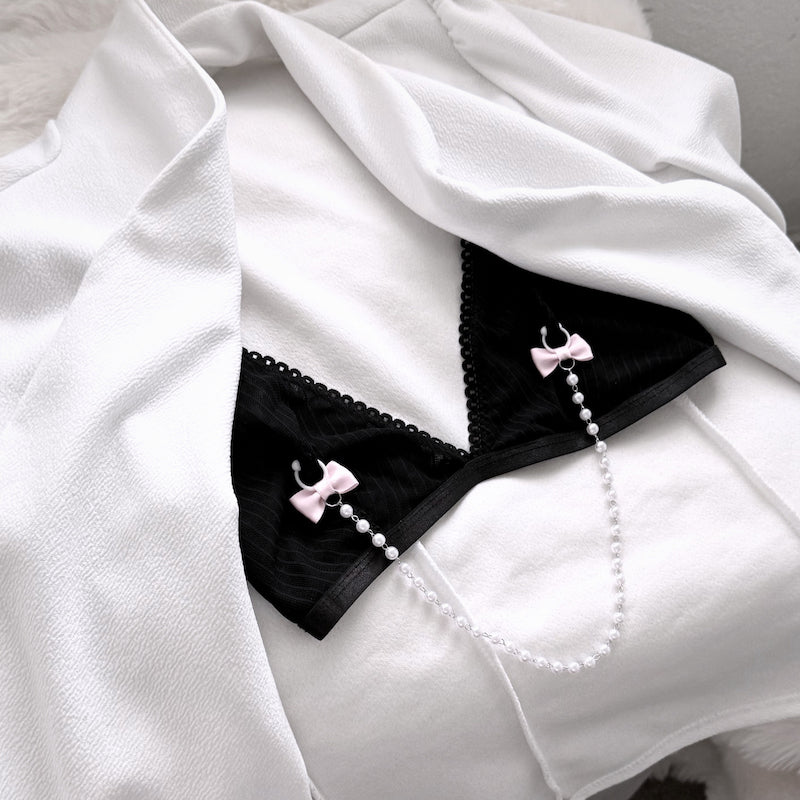 Centerfold Pink Pearl Nipple Clamps on Black Bra in white boudoir