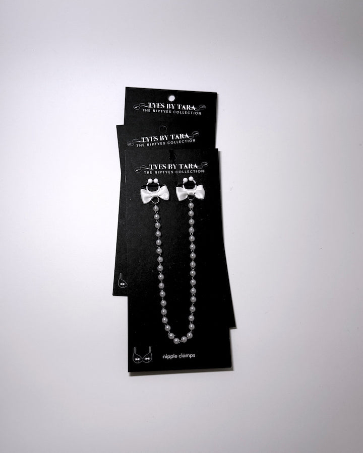 Pearl Nipple Clamps on black cards showing the pack of 3