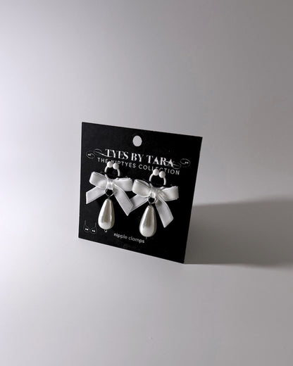 Marie Antoinette White Bow Pearl Nipple Clamps with Teardrop Pearls Packaging View on Black Card