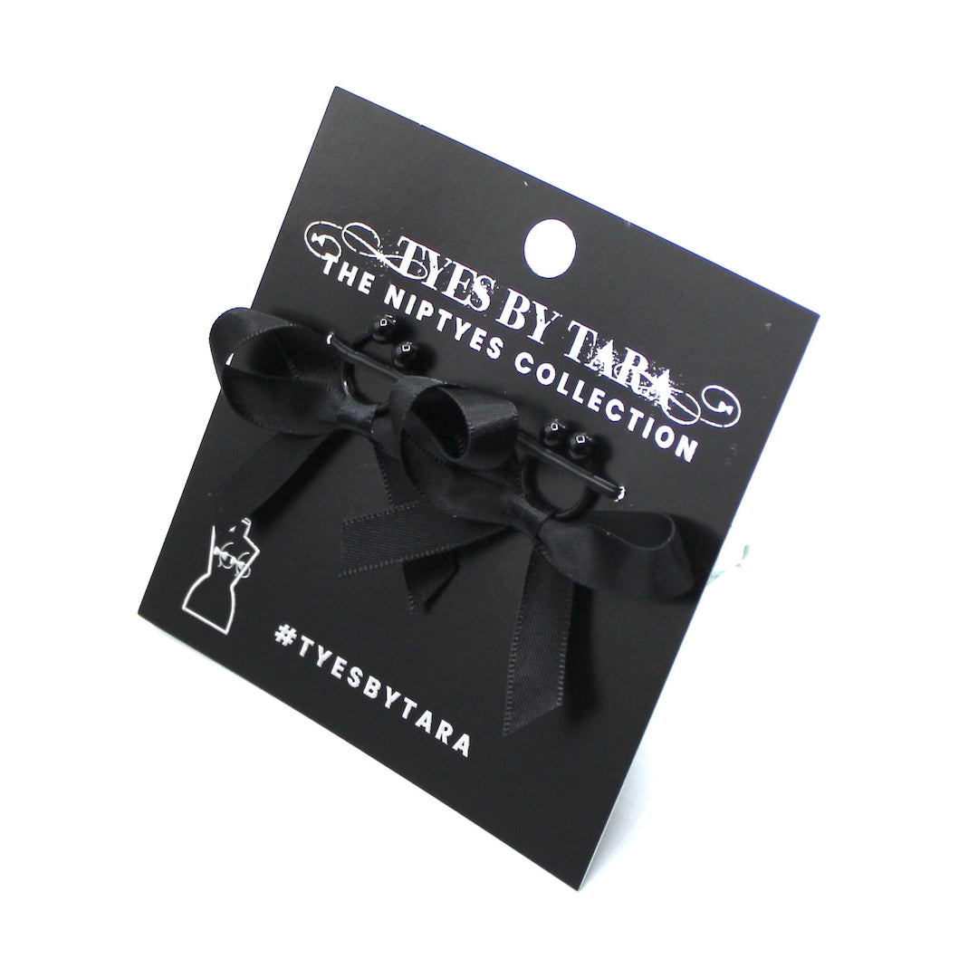 Black XO Bow Earrings on Black Card