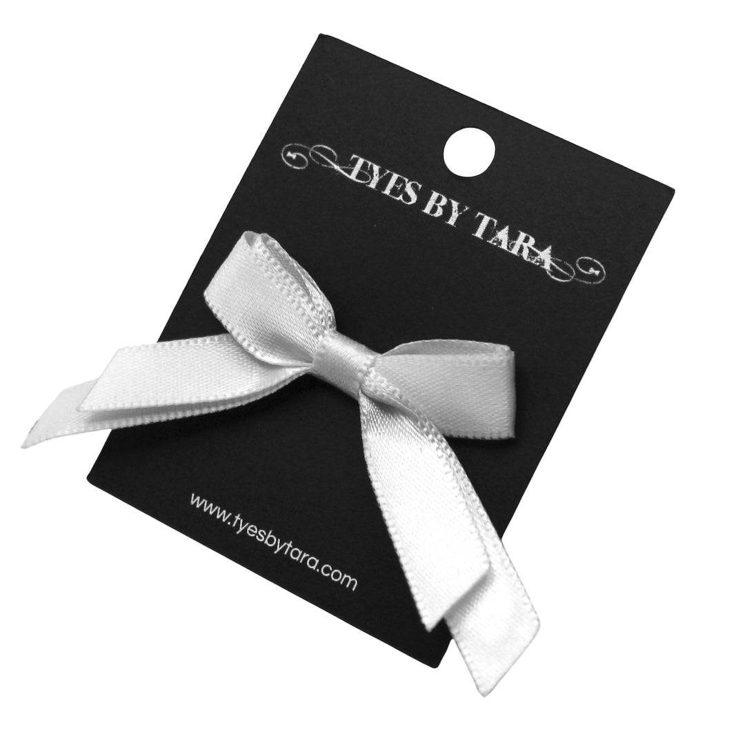 Doll White Bow Ring on Black Card