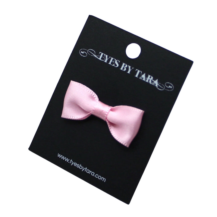 Hickey Pink Bow Ring on Black Card