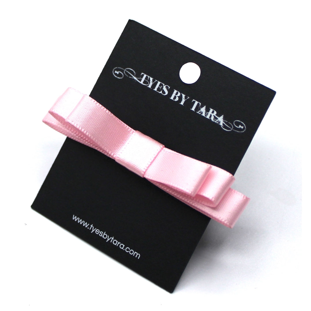 Highness Pink Bow Ring on Black Card