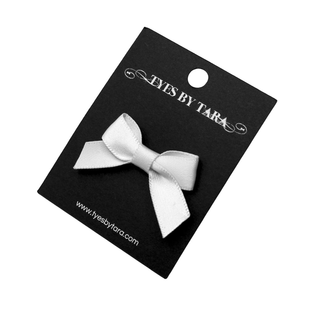 White Honey Bow Ring on Black Card