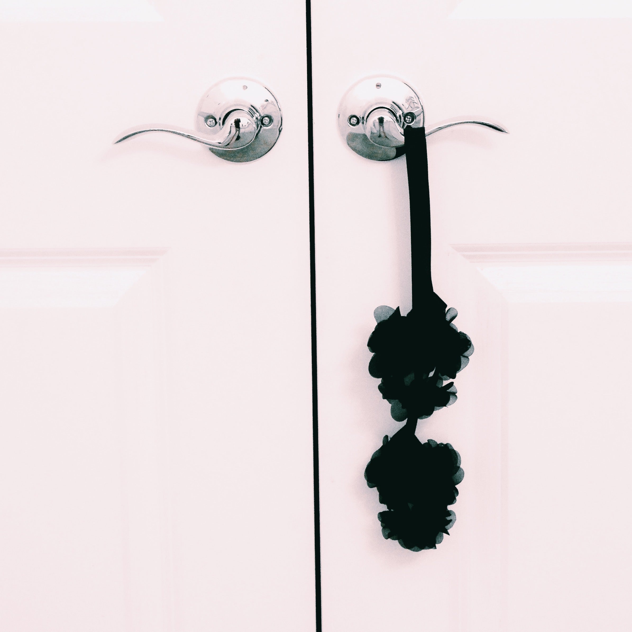 Black Flower Soft Bondage Handcuffs on Door