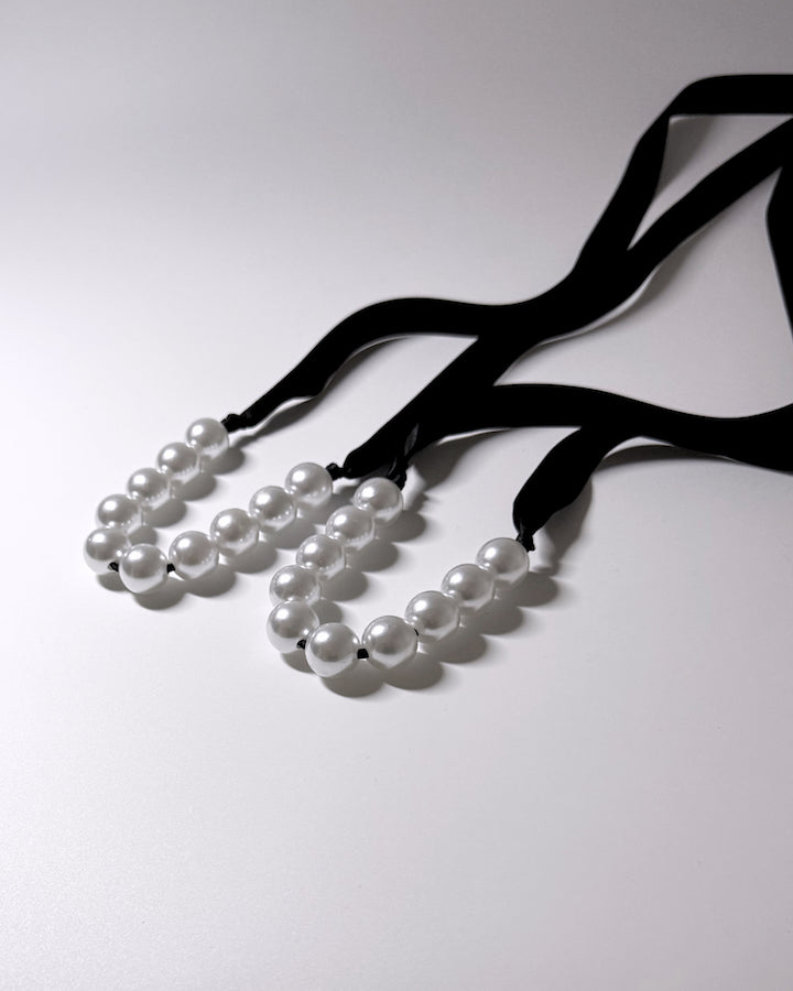 View of Mademoiselle Pearl Handcuffs untied showing long ribbons