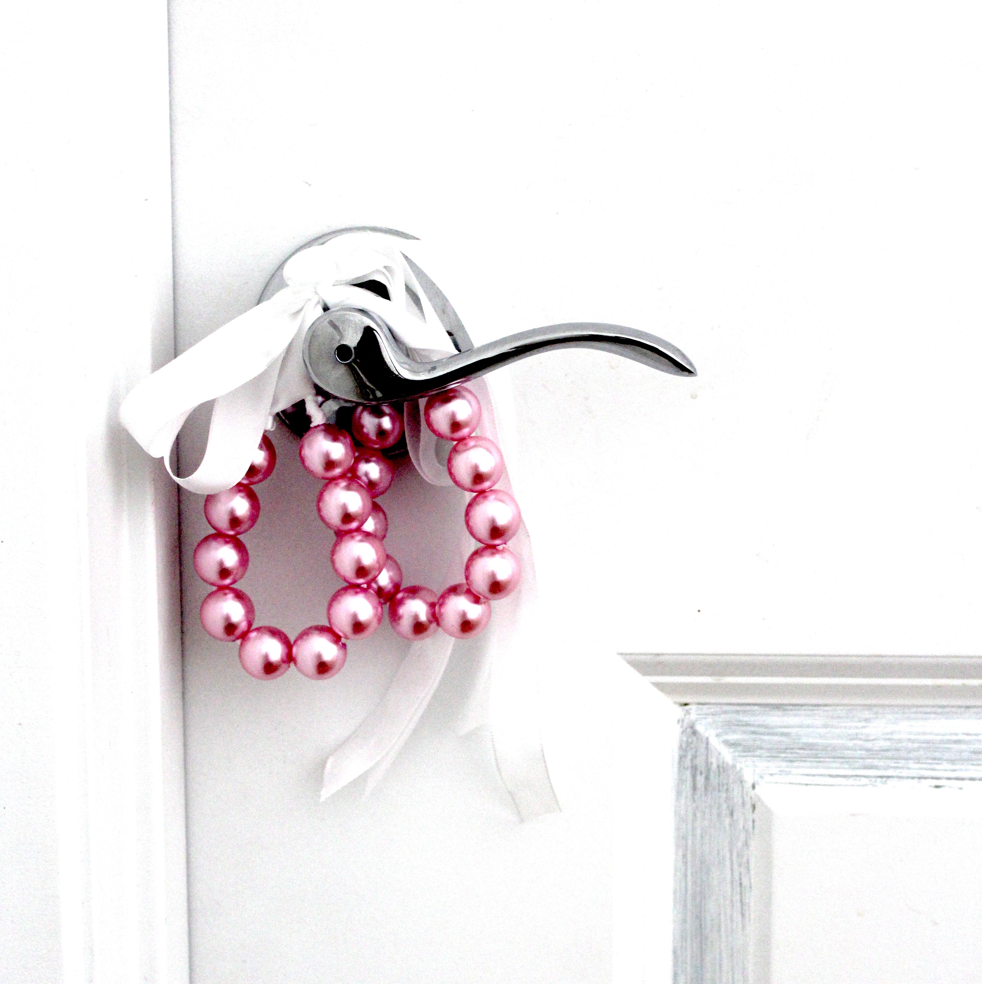 Faux Pink Pearl Handcuffs on DoorKnob