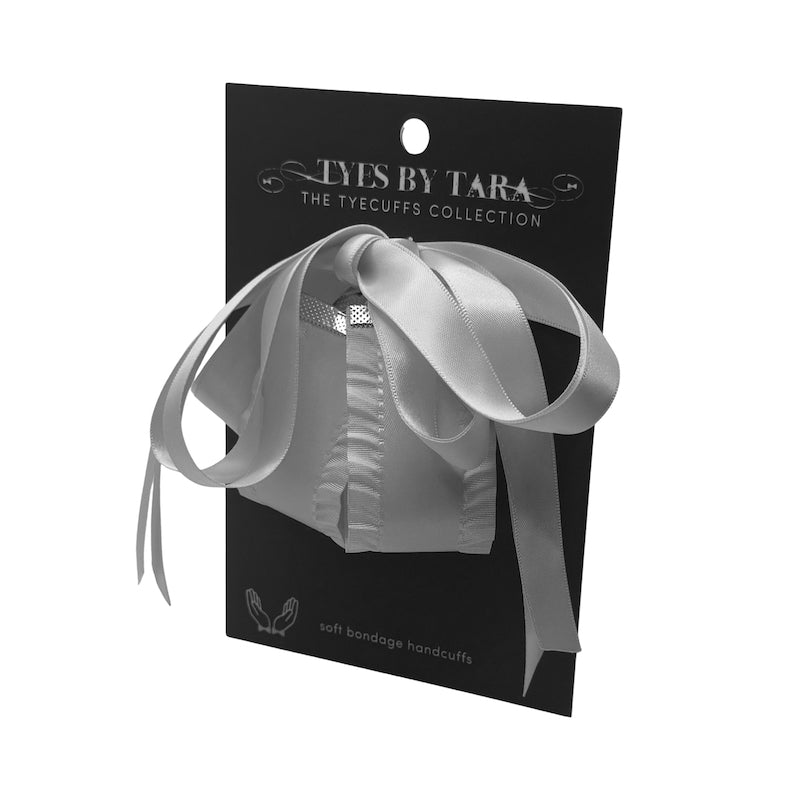 White Ruffled Handcuffs on Black Card