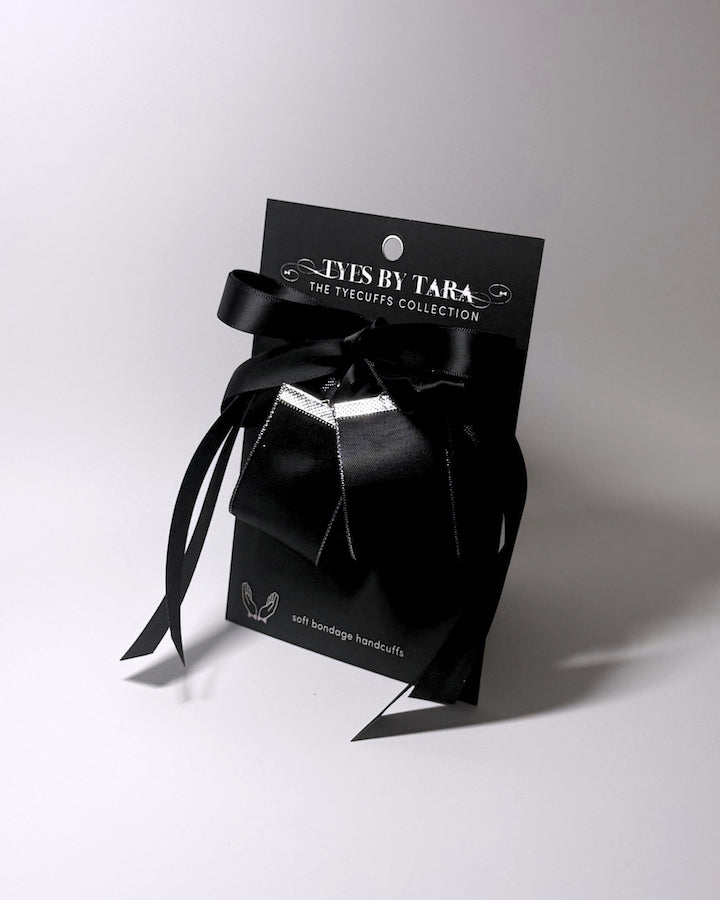 Queen Satin Cuffs on Black Card
