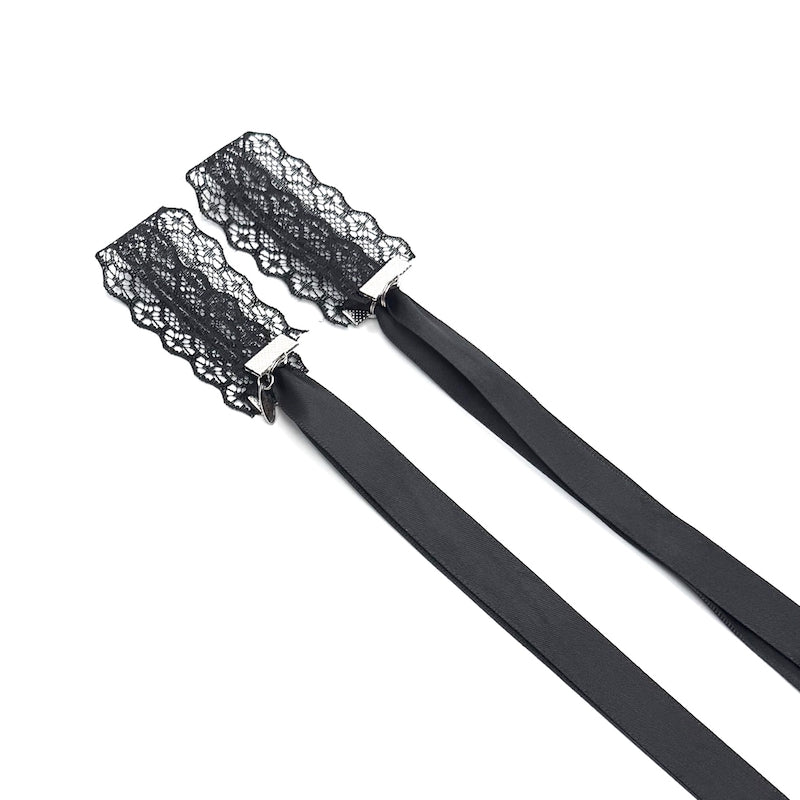 Siren Black Lace Handcuffs folded on a white background