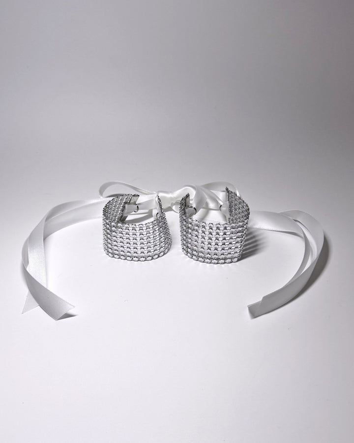 Vixen Sparkly White Rhinestone Mesh Handcuffs on light gray background