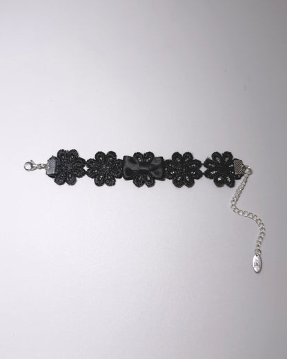 Blossom Black Flower Bracelet  Flatlay