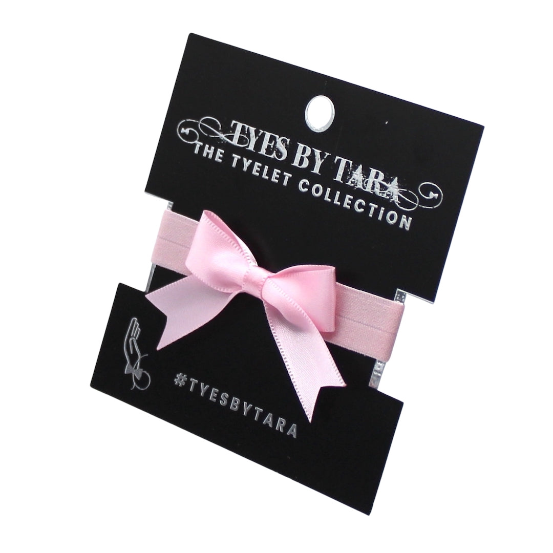 Pink Bow Bracelet on Black Card