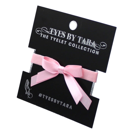 Pink Doll Bow Bracelet on black card
