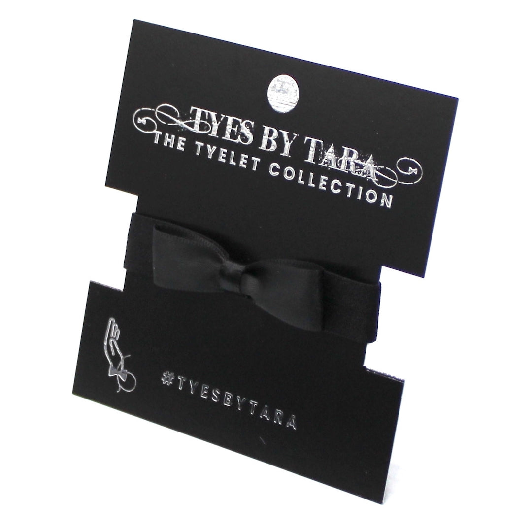 Femme Fatale Black Bow Bracelet on Black Packaging Card