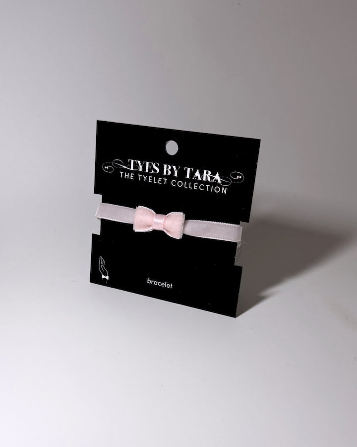 Madame Pink Velvet Bow Bracelet on black card