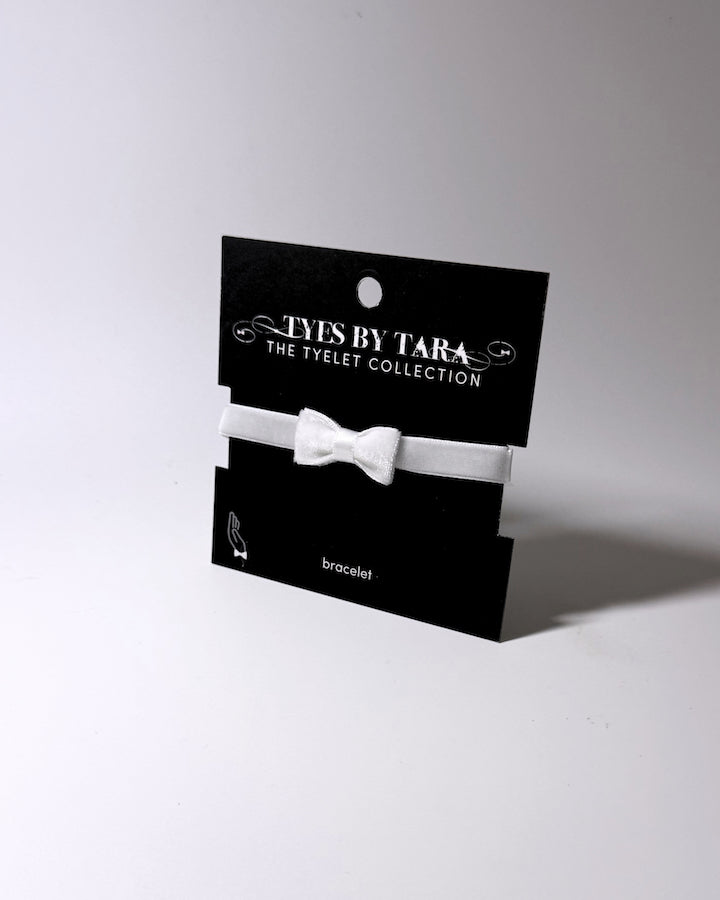 Madame White Velvet Bow Bracelet on Black Card