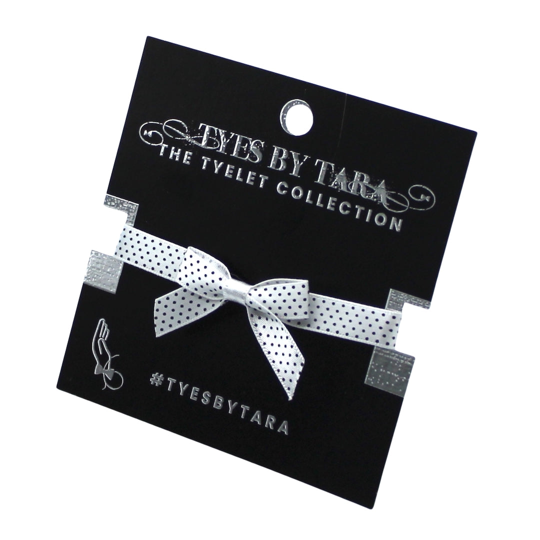 White Pinup Bow Bracelet on Black Card