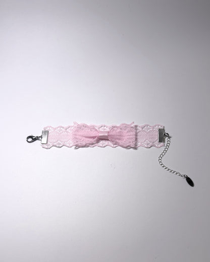 Siren Pink Bow Lace Bracelet on light gray background